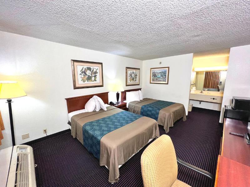 Heritage Inn And Suites Inniswold Exterior foto
